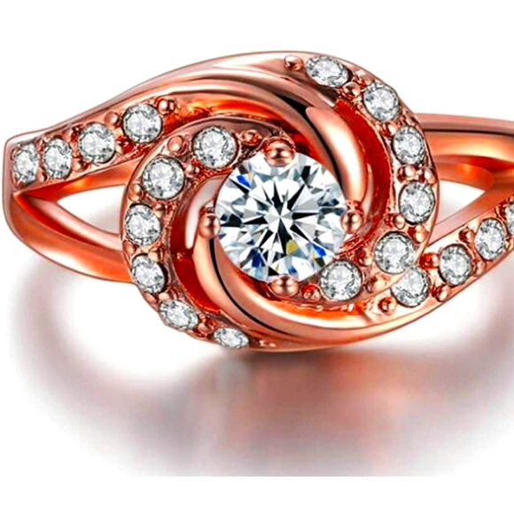 roses_garden Jewelry - Rose Gold Plated Spiral Twisted Wave Ring NWT